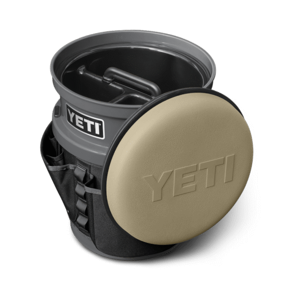 The Fully-Loaded Bucket With Tan Swivel Seat Site Studio Outdoor Living Loadout Bucket Swivel Seat Tan on Charcoal 3qter Loaded 10527 B 2400x2400 YETI Cooler Shop
