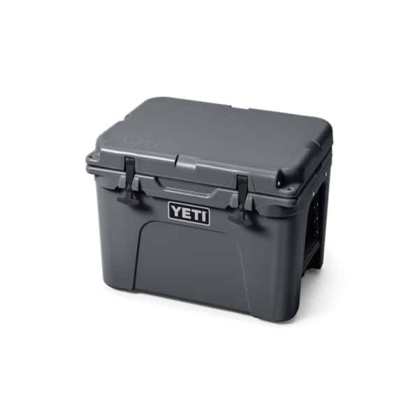 YETI Tundra® 35 Hard Cooler W 220078 1H23 Color Launch site studio Hard Coolers Tundra 35 Charcoal 3qtr Lid Down 3434 Primary B 2400x2400 yeticoolershop.com