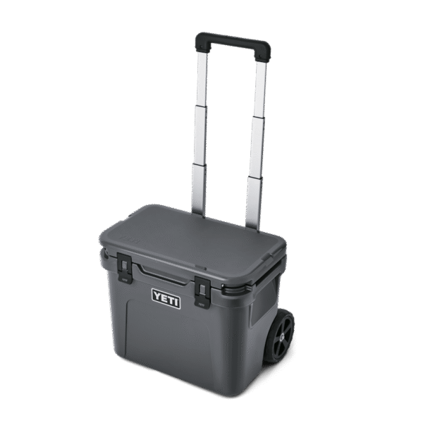 YETI Roadie® 32 Wheeled Cooler - Charcoal W site studio hard goods Roadie 32 Charcoal 3QTER 4249 Primary B 2400x2400 yeticoolershop.com