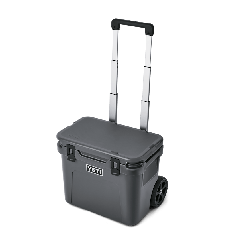 YETI Roadie® 32 Wheeled Cooler - Charcoal W site studio hard goods Roadie 32 Charcoal 3QTER 4249 Primary B 2400x2400 yeticoolershop.com